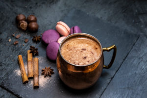 Hot chocolate, macaroons, cinnamon sticks, star anise Hot chocolate, macaroons, cinnamon sticks, star anise